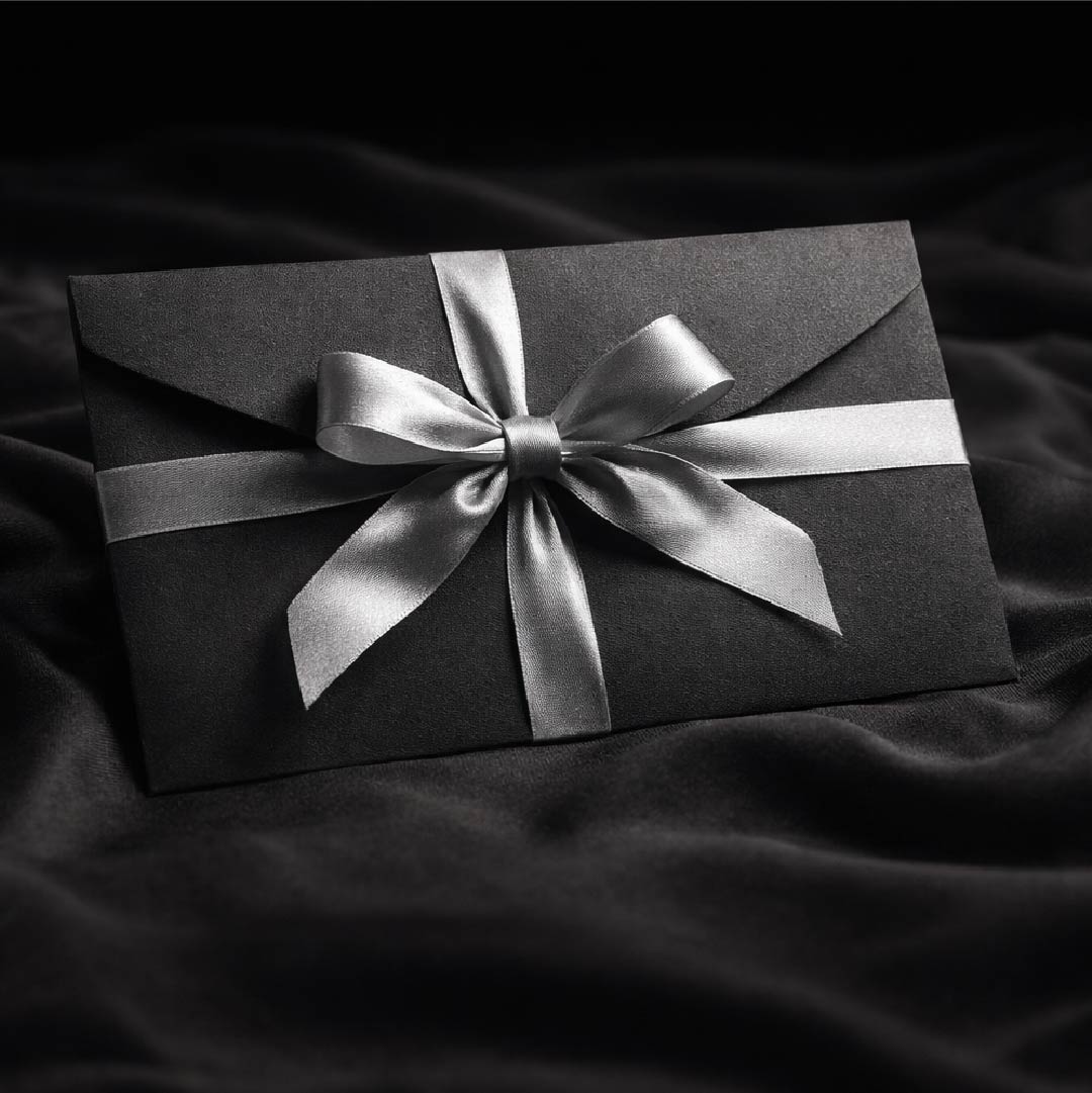 gift voucher limerick black envelope with silver ribbon